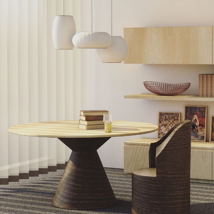 Comedor moderno con mesa redonda, sillas de rafia, lámparas colgantes y decoración minimalista